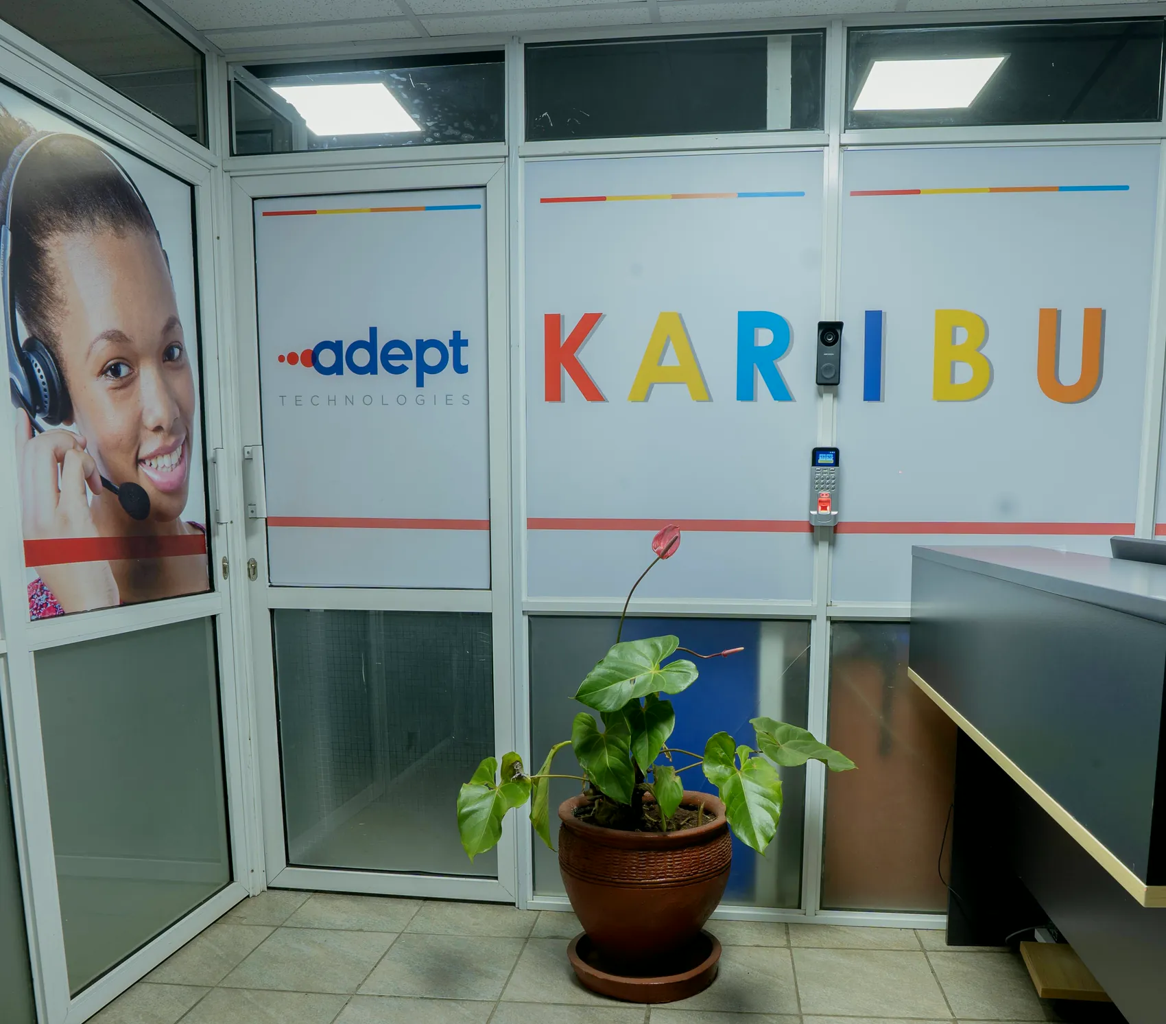 The Adept Technologies reception, with a colourful Karibu welcome sign