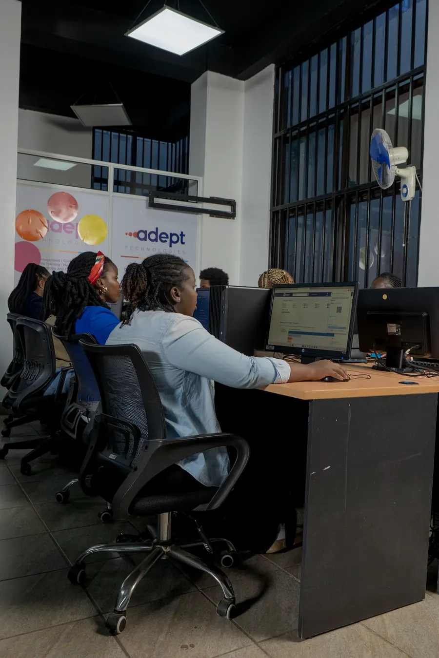Adept's delivery team working at annotation workstations